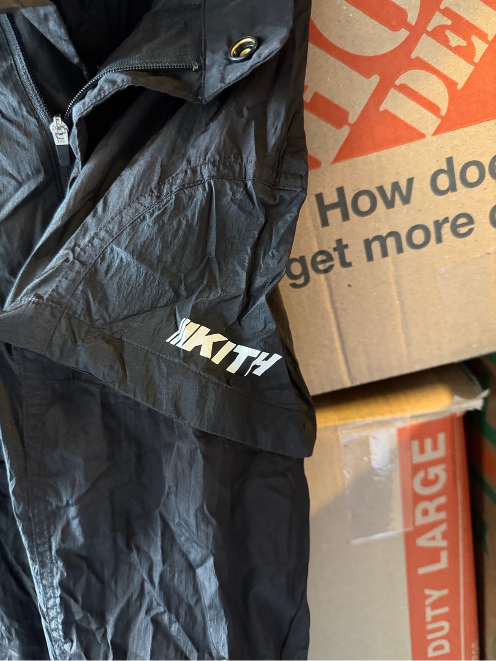 Kith Black Windbreaker Pants with White Logo